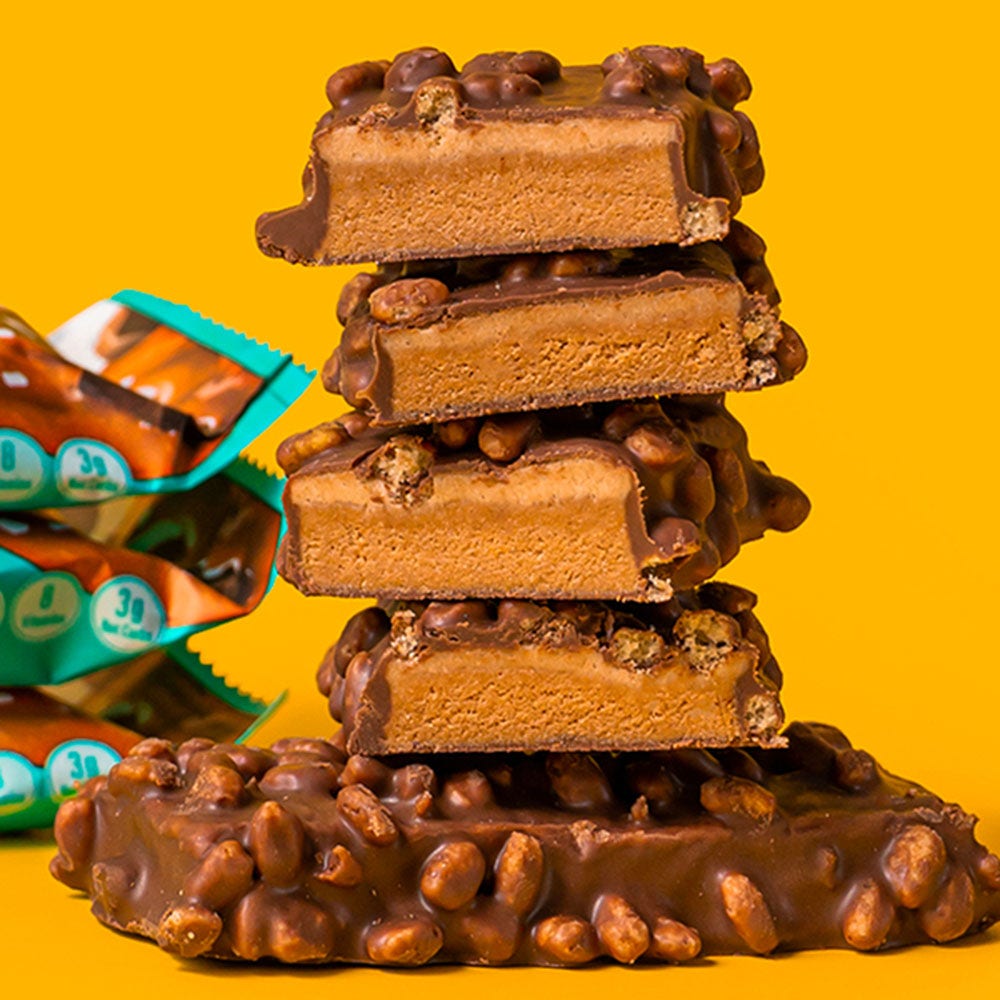 stack of warpped and unwrapped fulfil chocolate salted caramel vitamin and protein bars